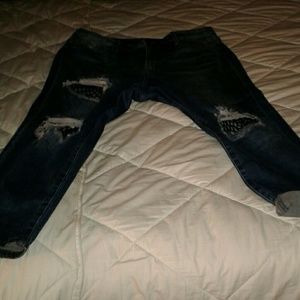 Distressed denim pants